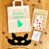 Kit Halloween enfant complet avec sac à bonbons, bracelet lumineux, tatouages phosphorescents et activité manuelle.
