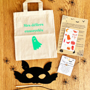 Kit Halloween enfant complet avec sac à bonbons, bracelet lumineux, tatouages phosphorescents et activité manuelle.