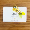 Petite attention originale à moins de 5 euros comprenant un porte-clé citron et sa mini-carte Merci.